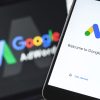 Google Ads (AdWords) logo on the screen smartphone. Google Ads i